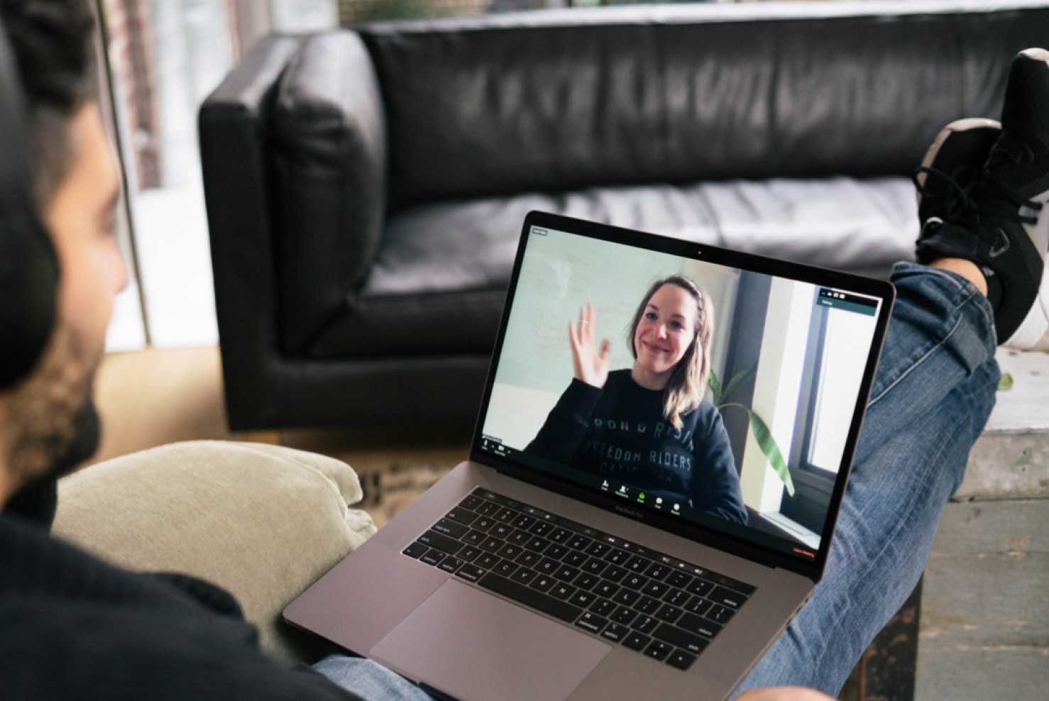 Creative Director on a screen meeting with a teammate