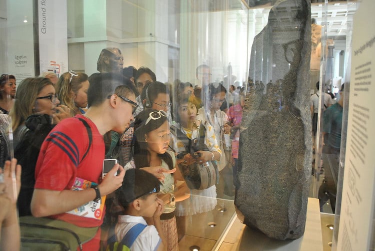 Museum Goers Viewing the Rosetta Stone at British Museum